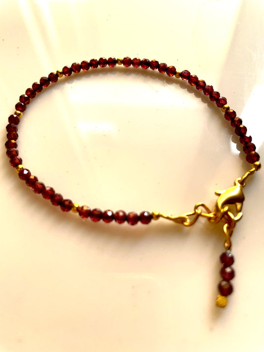 Gold polished beads with Garnet