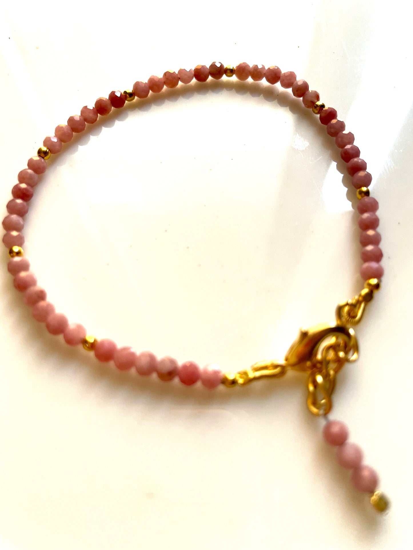 Gold polished beads with Rhodonite